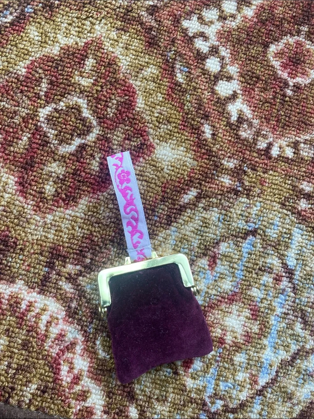 This item is the American Girl Rebecca's velveteen purse
